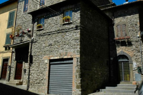 Гостиница La Rocca Apartment Alloggio Turistico  Монтефьясконе